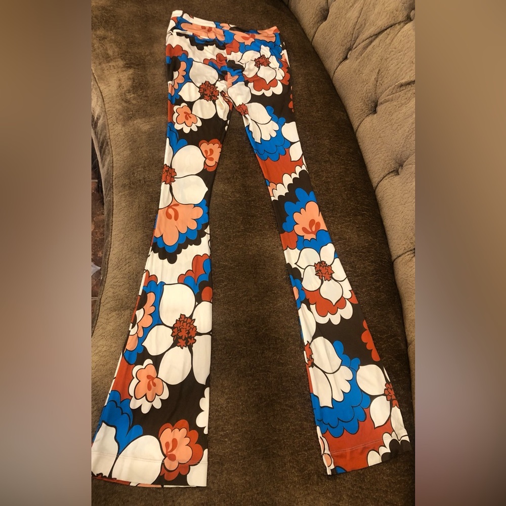 Ronny Kobo Jersey boho floral print flared hippie pants size small
Excellent!
